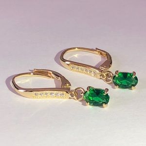 Oval synthetic emerald earrings